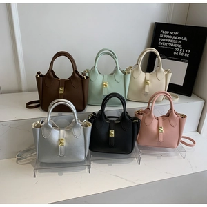 Litchi texture bucket bag in six colors with gold rotary lock and slim straps