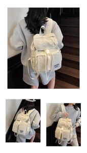 Detail showing versatile carrying ways for the cream white casual nylon backpack