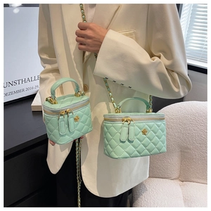 Mint green quilted box bag with gold chain strap in mini and medium sizes