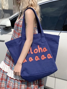 Large navy canvas tote bag with orange Aloha print for casual summer beach style