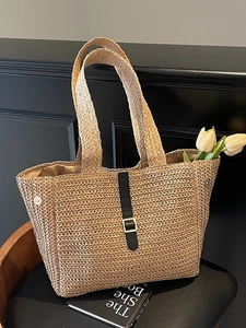 Sac fourre-tout en paille tressée beige avec lanières en cuir noir et boucle en métal doré