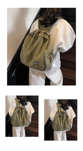 Détail d'un sac à dos léger en nylon vert olive avec fermeture à cordon et poches latérales
