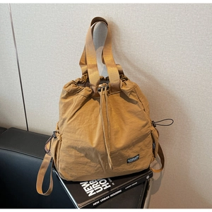 Sac à dos marron en nylon à cordon avec écusson DOUGU et grande capacité pour femme