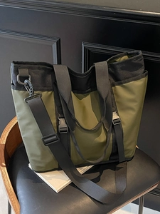 Large capacity olive green oxford tote bag for commuting with adjustable shoulder straps