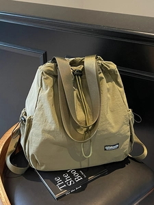 Sac à dos en nylon vert olive à cordon avec poches latérales et poignée tissée