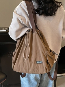 Sac à dos marron léger en nylon avec cordon de serrage, style décontracté et grande capacité