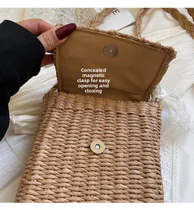 Detail of beige straw crossbody bag featuring invisible magnetic closure for easy opening