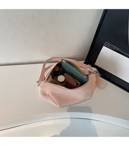 Pink faux leather tote bag interior showing capacity for phone, wallet and cosmetics