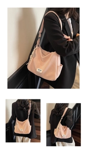 Pink casual tote bag with adjustable strap and tennis racket charm detail