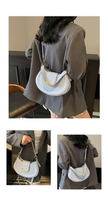 Detailed views of the light blue lychee pattern saddle bag with gold buckle hardware