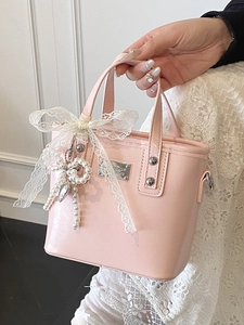 Chic pink bucket bag with lace bow and pearl pendant for women’s casual commute