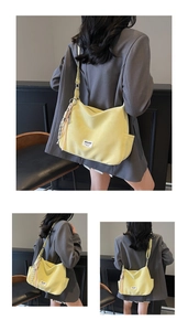 Collage of model wearing light yellow large tote bag with fringe charm detail