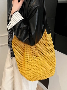 Handwoven yellow hollow-out tote bag with contrast black PU leather shoulder straps