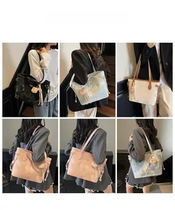 Collage of large capacity tote bags in six colors shown on a model from various angles