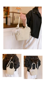 Sac seau tissé beige avec nœud en dentelle pendentif perle et poignées en cuir souple