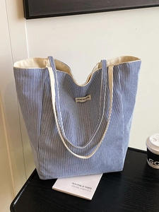 Large blue and white striped canvas tote bag with comfortable cream shoulder straps