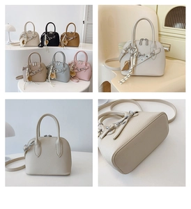 Detail view of lychee pattern leather shell bag with detachable strap in various colors