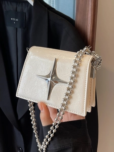 Chic creamy white Y2K mini crossbody bag with silver star decor and bead chain