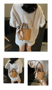 Detailed views of a brown pebbled leather bucket bag with decorative scarf and gold hardware
