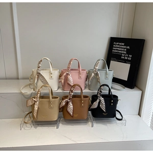 Litchi texture mini bucket bags in multiple colors with decorative silk scarves and straps