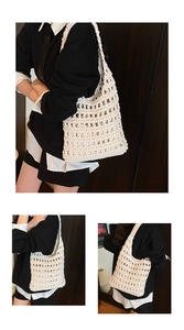 Detail view of beige handmade crochet shoulder bag with hollow mesh weave and drawstring liner