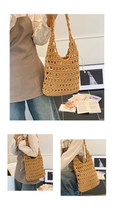 Detailed close-up of a hollow woven straw shoulder bag with a white drawstring inner pouch