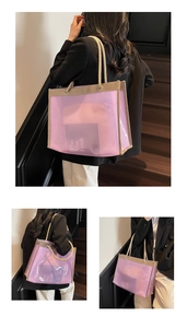 Detailed macro view of purple transparent jelly tote bag with hemp rope strap and inner pouch