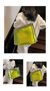 Detail of neon yellow transparent PVC tote bag with woven rope handles and inner pouch