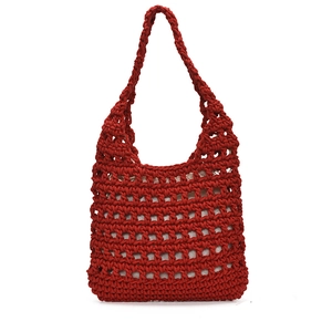 Handmade red hollow woven shoulder bag with large capacity and drawstring inner pouch