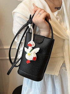 Mini sac seau noir en cuir litchi avec pendentif canard mignon pour femme élégante