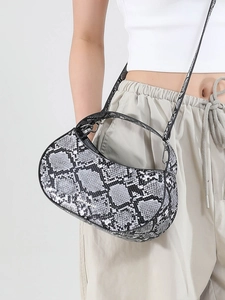 Python pattern half-moon shoulder bag in black and white leather with dual straps