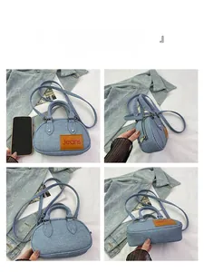 Detailed views of a blue denim bowling bag with leather label and zipper closure