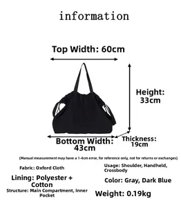 Detalle del bolso tote negro de tela oxford con dimensiones y amplios bolsillos internos