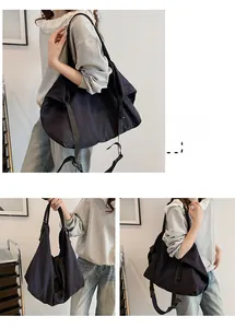 Detalle macro del bolso hobo de lona de gran capacidad con cordón y correa ajustable