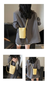 Three views of a yellow litchi pattern mini crossbody bag styled with a grey blazer
