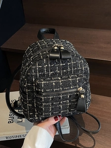 Elegante zainetto in tweed nero e oro con trama intrecciata classica e dettagli dorati