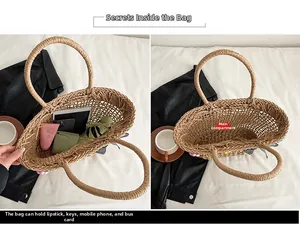 Detail view of woven straw tote bag showing large capacity for essentials like umbrellas