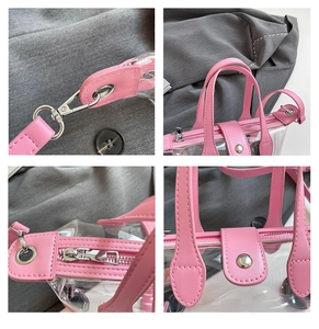 Detailansicht der rosa Ledernähte und Metallbeschläge an der transparenten PVC-Tasche