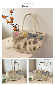 Detail of handmade straw tote bag with 3D knitted flowers and checkered bow decoration