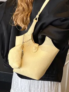 Hellgelbe Leder-Eimertasche mit Narbenleder und abnehmbarem kleinem Beutel für Damen
