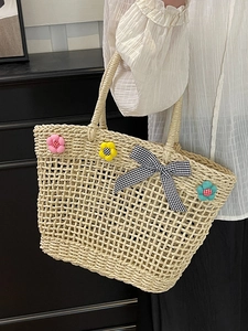 Handmade straw tote bag with colorful 3D flowers and bow for summer beach vacation