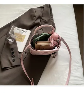 Top view of pink bucket bag showing large interior space for phone and wallet