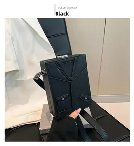 Detail of creative suit-style black leather box bag on chair with necktie pattern