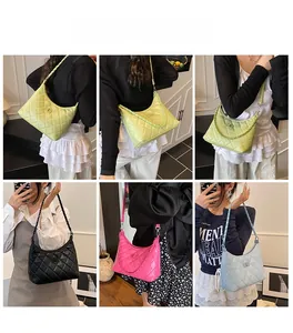 Quilted hobo bags in green, black, pink, and blue shown on models for style