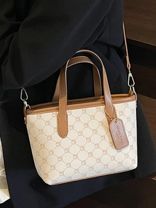Sac fourre-tout en toile beige avec imprimé géométrique et lanières en cuir