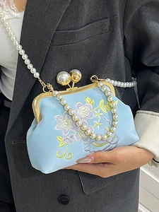 Elegant light blue embroidered frame bag with pearl clasp and chain for women