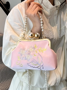 Elegant Chinese style pink silk clutch bag with floral embroidery and pearl handle