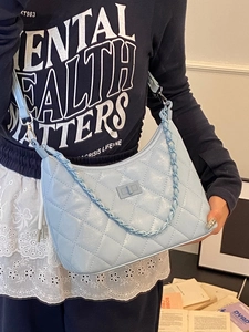 Quilted light blue crescent underarm bag with chain strap and twist lock for women