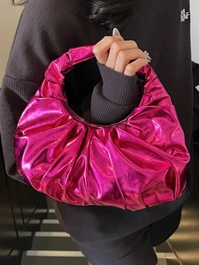 Metallic magenta ruched handbag with mirrored finish and stylish curved design for women