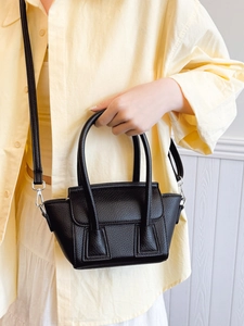 Chic black litchi pattern bucket bag for women, stylish underarm shoulder and crossbody bag